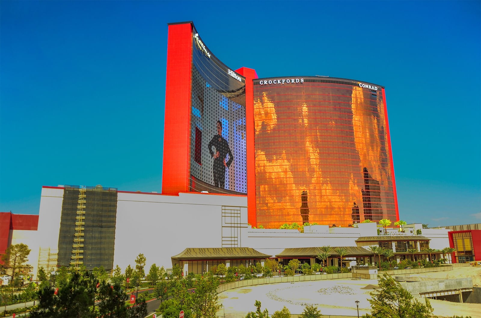Resorts World Las Vegas hotel tower and its red LED exterior on the North Strip
